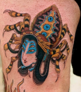 blue spider with female head aka jorogumo tattoo